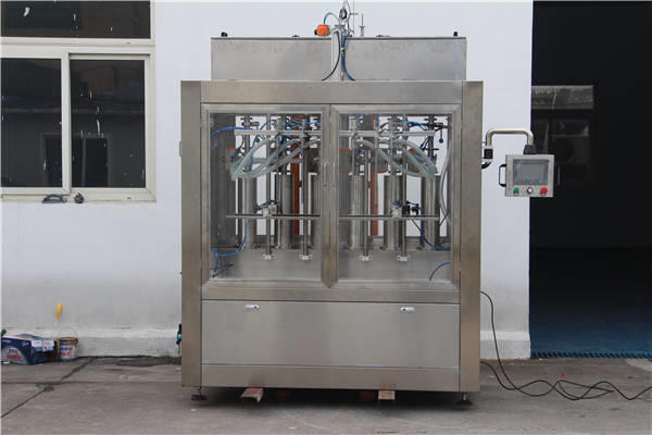 Автоматична машина для наповнення пляшок варенням